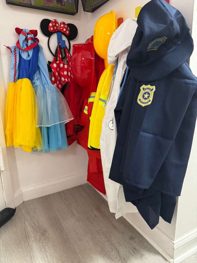 Dress-up corner with costumes and props